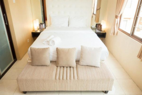 Antique 3BR at Grand Setiabudi Apartment By Travelio